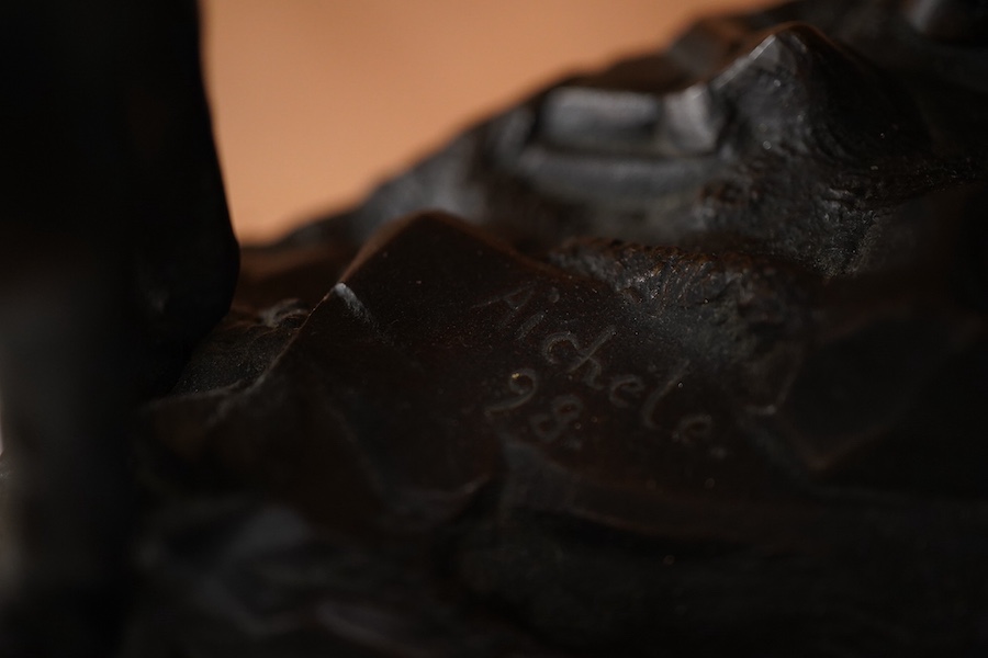 After Paul Aichele (1859-1910), a pair of bronze figures of Arab boys riding donkeys, 23cm